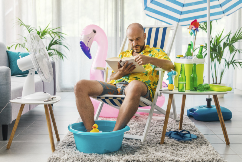 Man spending his summer vacations at home